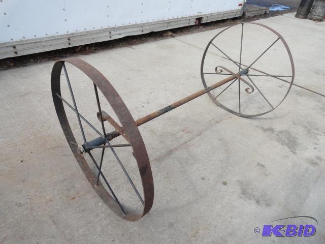 lot 13 image: Decorative wheel set, wheels are 21" dia...