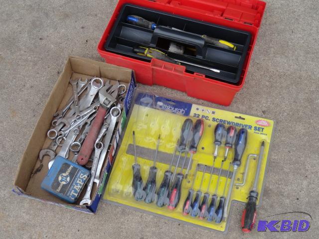 lot 138 image: Keter storage box full of tools, wrenches, ta...