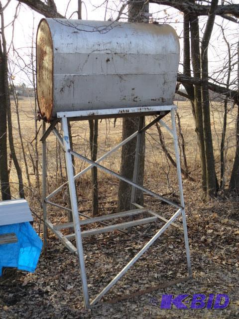 lot 74 image: 100 gallon storage tank on steel stand...