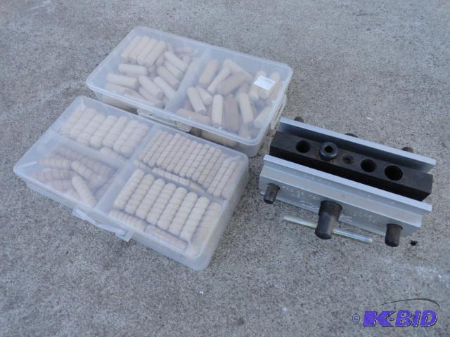 lot 85 image: TASK dowel jig with an assortment of dowels...