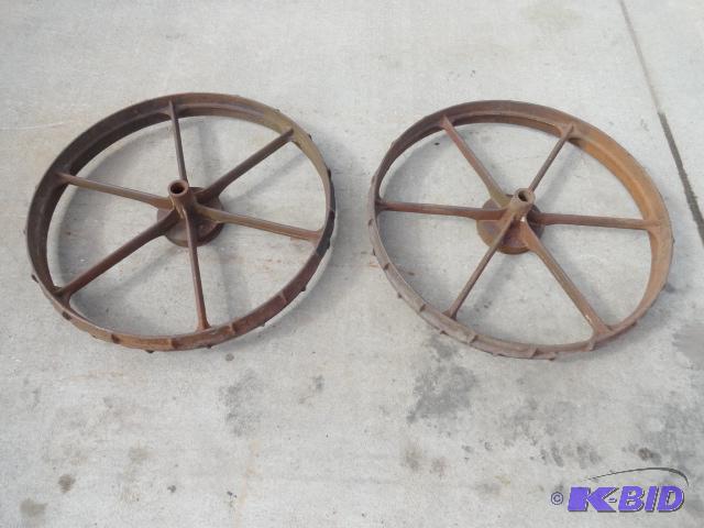 lot 9 image: Matching pair of IH MC 625 cast iron wheels 3...