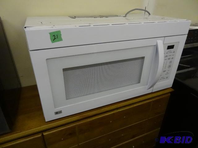 lot 21 image: LG LNV1680WW Over the Range Microwave. Turnta...