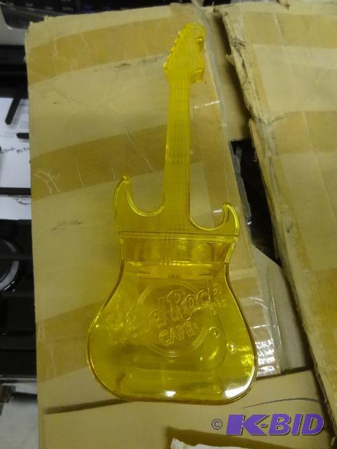 lot 72 image: Hard rock cafe martini shaker. Guitar shaped....