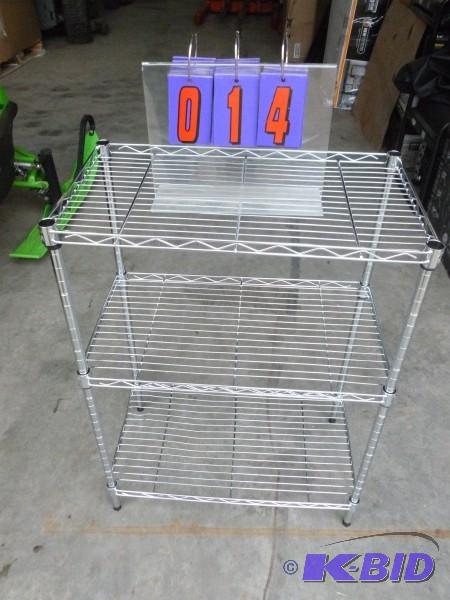 lot 14 image: Chrome laundryplant stand. As shown. 30"...