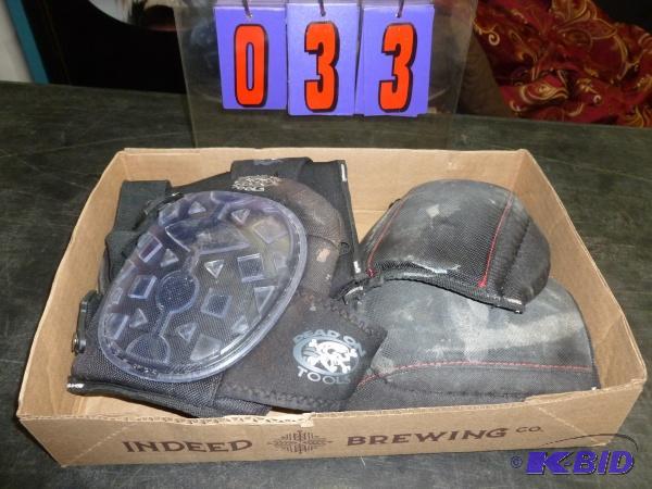 lot 33 image: Flat of used knee pads. Dead on brand. Terms....