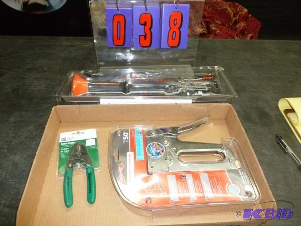 lot 38 image: Ram set and staplers. As shown. With pliers. ...