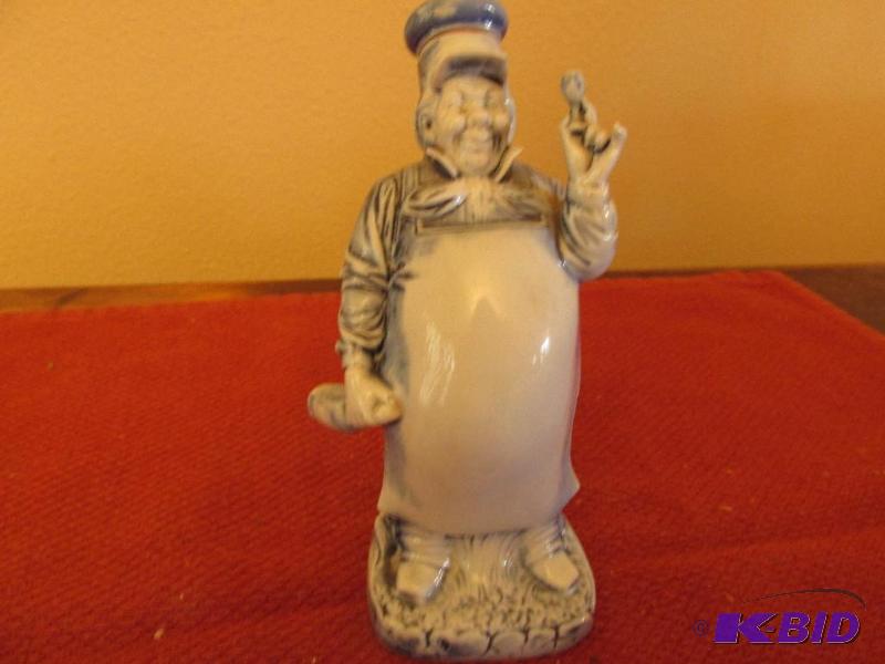 lot 106 image: This is a FLASK Ceramic Baker - hides a stopper in his hat