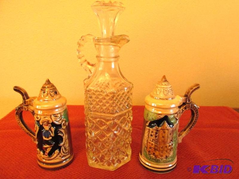 lot 141 image: Salt and Pepper Shakers and a Vinagar Cruet