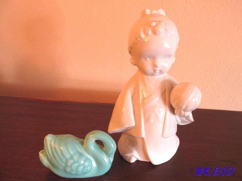 lot 16 image: Vintage Asian Child with Aqua Swan