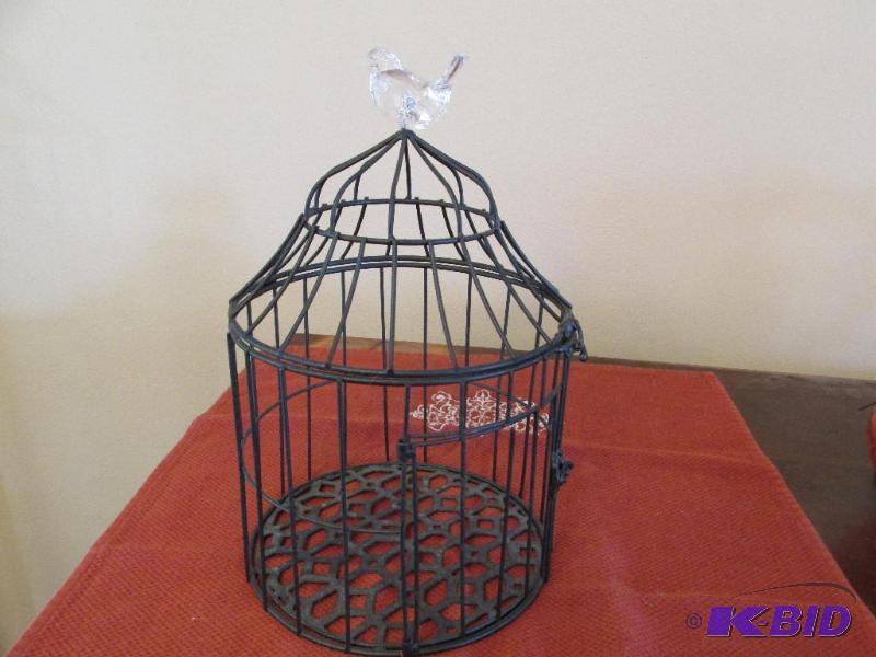 lot 41 image: The Cutest Little Bird Cage with a Little Bird on Top