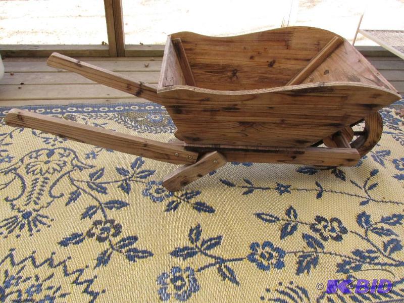 lot 96 image: Little Wooden Wheel Barrow Planter