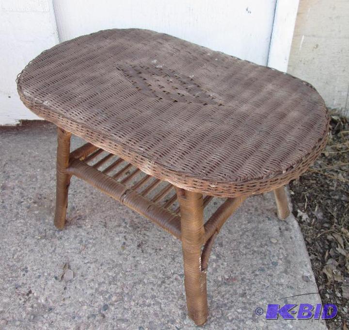 lot 107 image: Looks like new wicker patio table, measures 2...