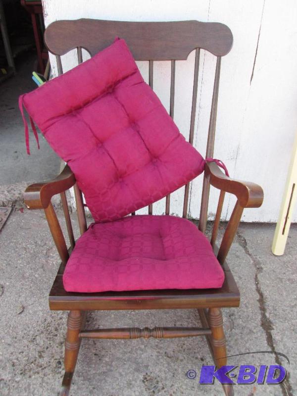 lot 121 image: Nice solid wood framed chair with red cushion...