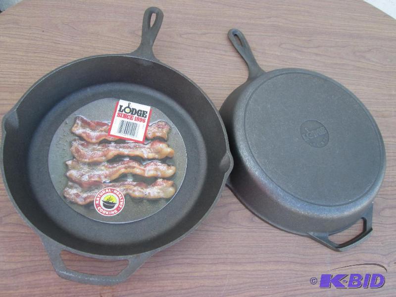 lot 124 image: Pair of new Lodge cast iron skillets, heavy a...