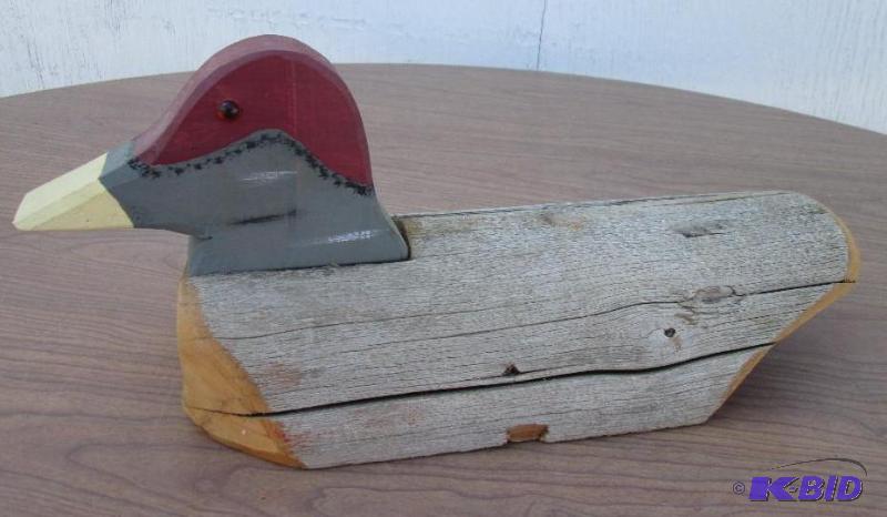 lot 125 image: Duck made of weathered wood...