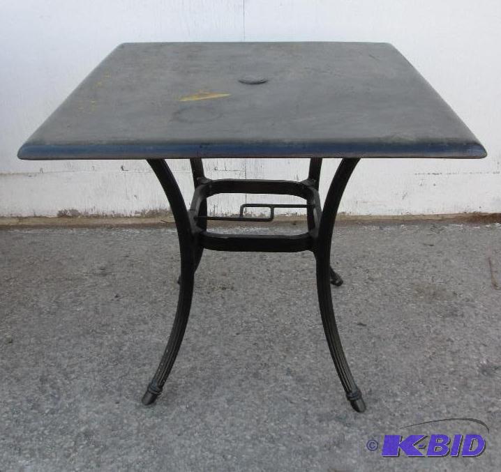 lot 128 image: All metal table, top is 30 x 30...