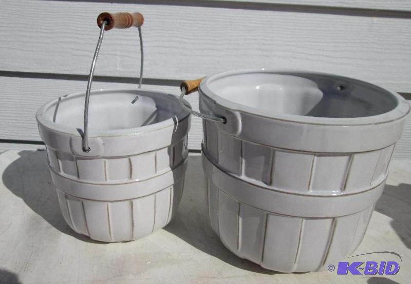 lot 142 image: 2 ceramic buckets with wood and wire handles...