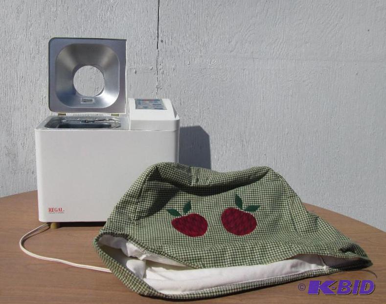 lot 58 image: Very clean bread bachine with cloth apple cov...