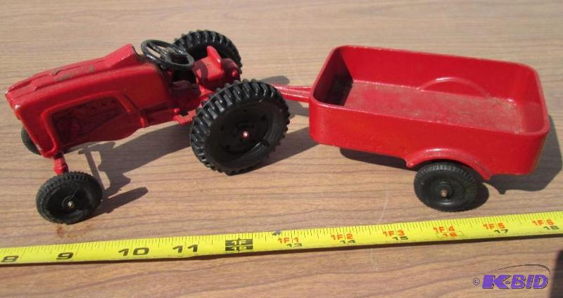 lot 59 image: Metal cast tractor replica with trailer...