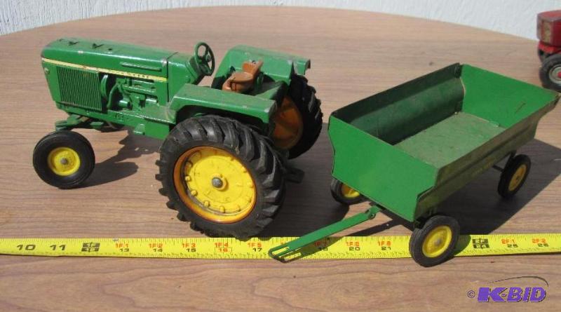 lot 63 image: John Deere tractor and trailer...