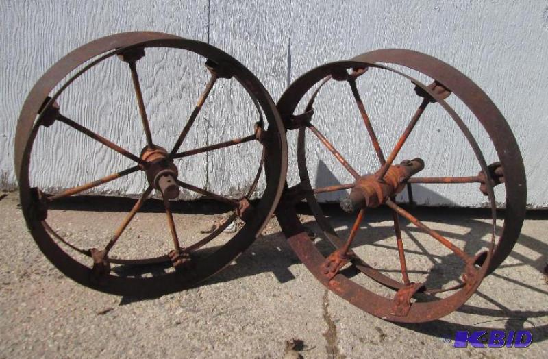 lot 79 image: Pair of all metal wheel rims measure 22 inche...