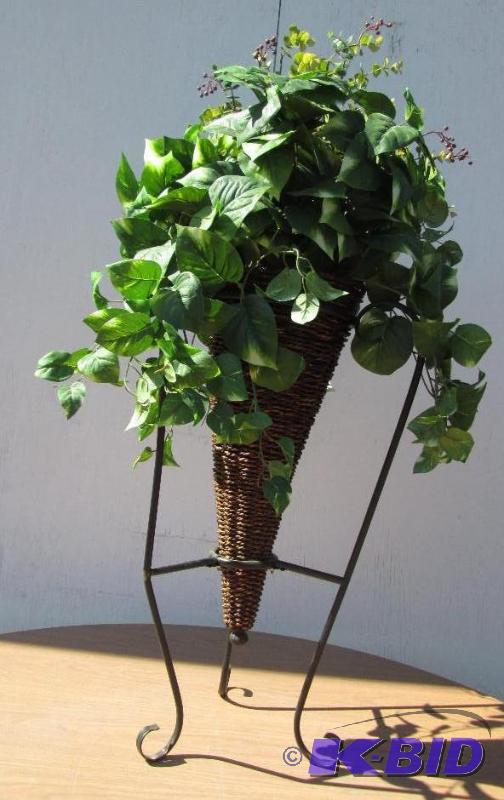 lot 86 image: Metal and wiccer plant stand with silk plant,...
