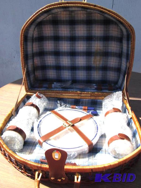 lot 95 image: Brand new picnic basket, with plates and utin...