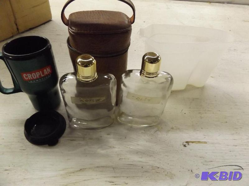 Coffee Mug, Two glass flasks in a zippered ca...