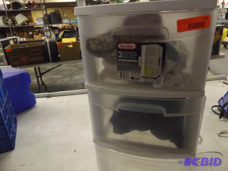 Plastic three drawer cart on wheels with cont...