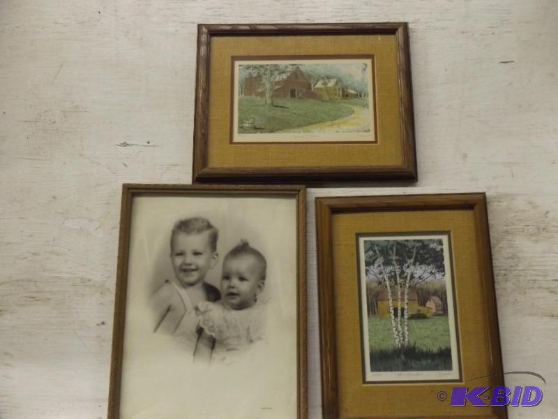 Three framed pictures, one of small children,...