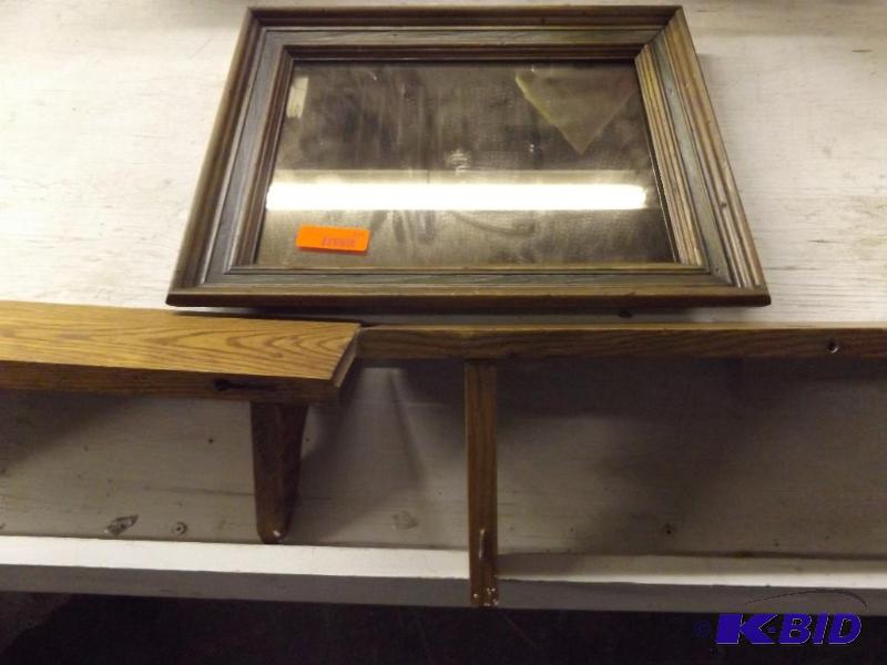 Two wooden shelves and a mirror...