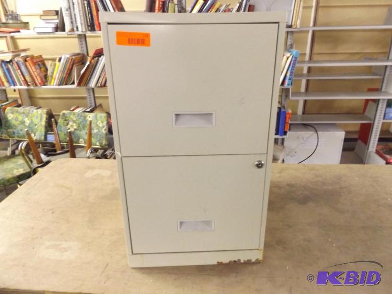 Two drawer filing cabinet, no key. Some rust ...