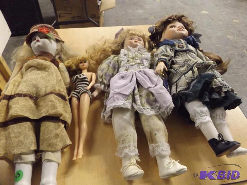 3 Dolls and a Barbie Doll...