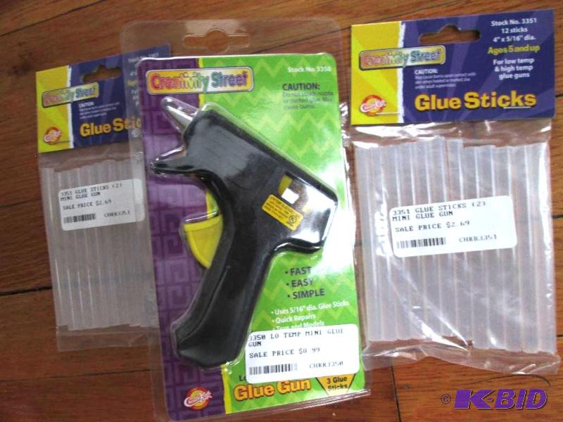 lot 109 image: Hot glue gun and 2 packs of sticks...