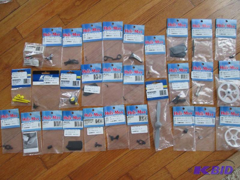 lot 111 image: Lot of assorted Heli-Max model plane parts gr...