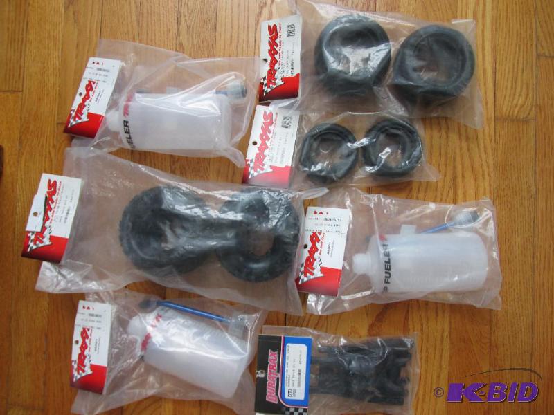 lot 118 image: Lot of model fuel filter bottles, wheels and ...