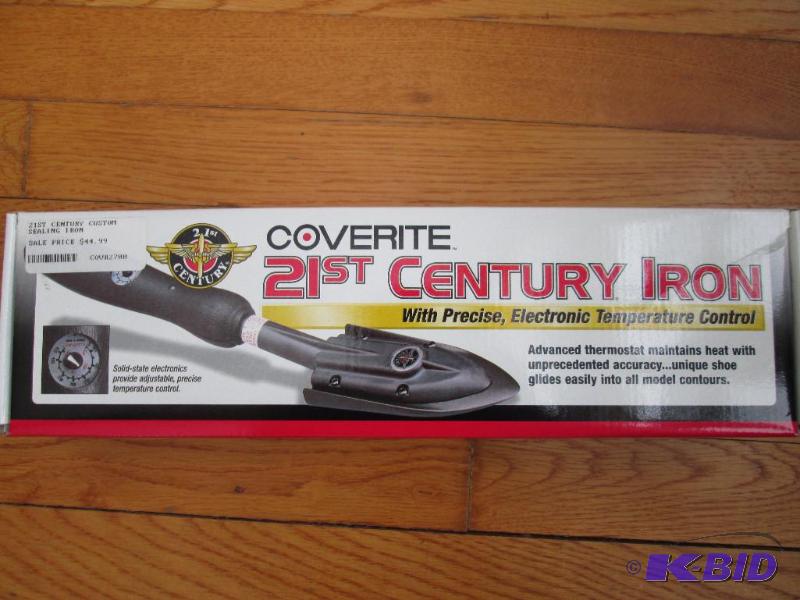 lot 28 image: Coverite 21st Century Iron shaped to glide in...