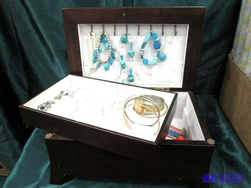 wooden jewelry box with jewelry used...