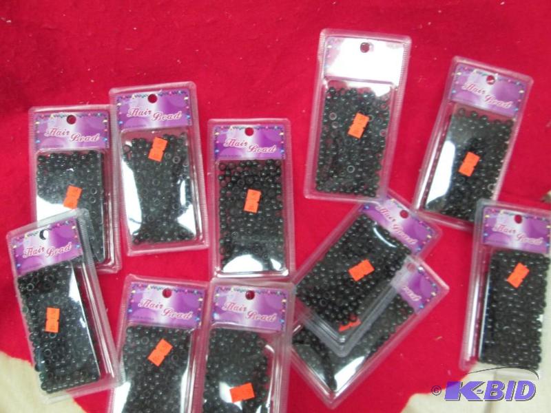 Qty 11 Black Hair beads...