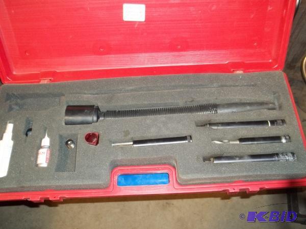 lot 15 image: Ford spark plug thread repair kit...