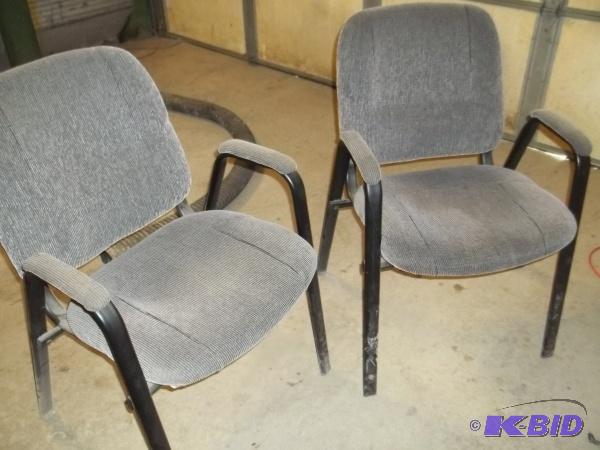 lot 32 image: 2 black and grey office chairs....