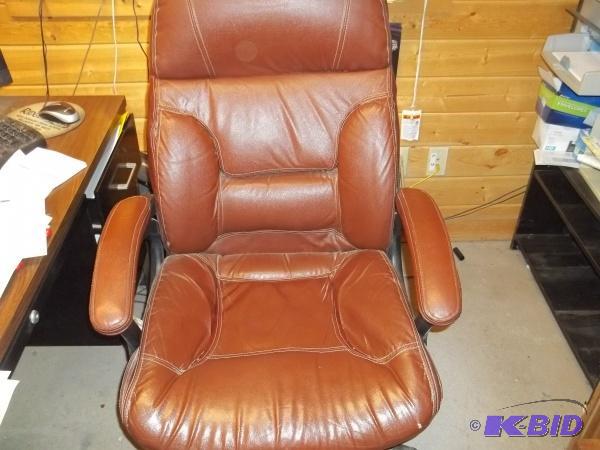 lot 37 image: Brown Leather office chair...
