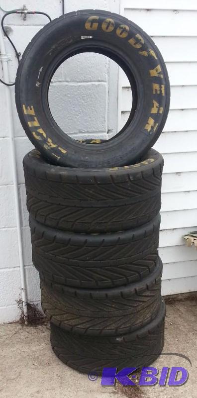 lot 8 image: Set of 5 Goodyear Racing Tires. 22 X 7.0-13...