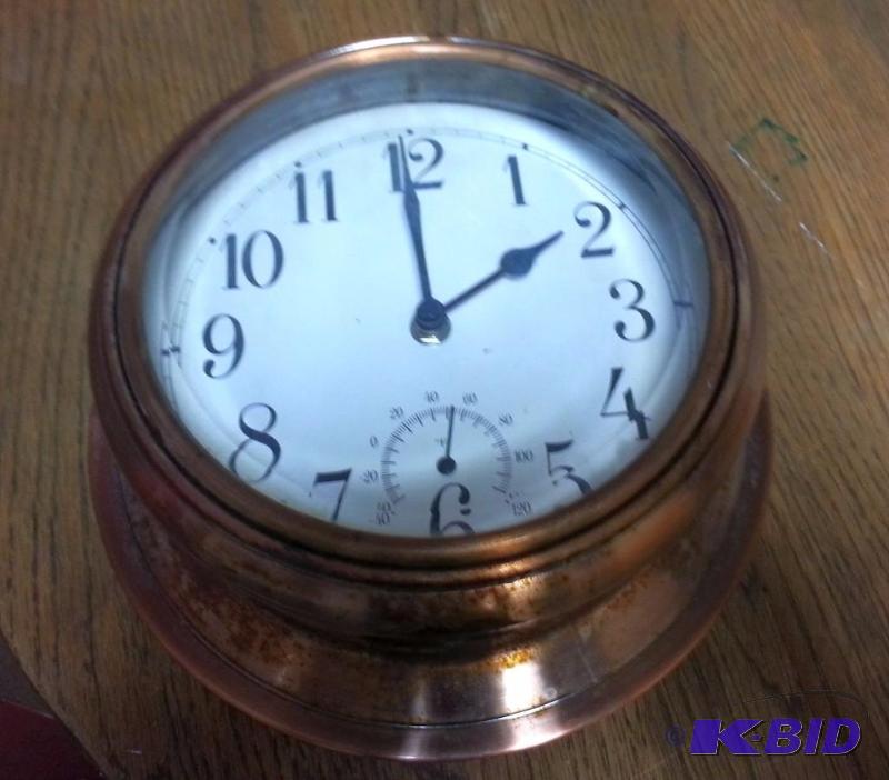 lot 16 image: Brass Port Hole Clock, Port Holes measures 8&...