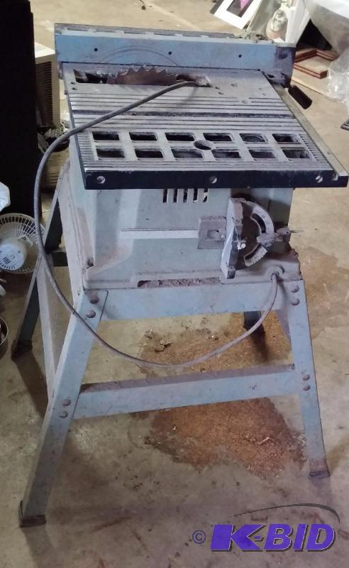 lot 10 image: Delta 10 Saw Bench Table Saw with Iron Stand...