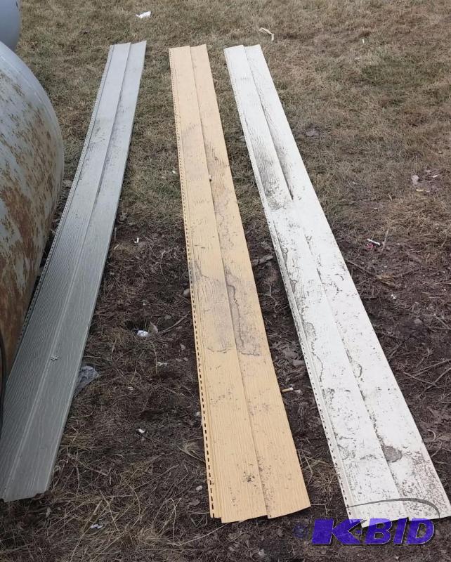 lot 11 image: HUGE amount of vinyl, aluminum siding. As see...