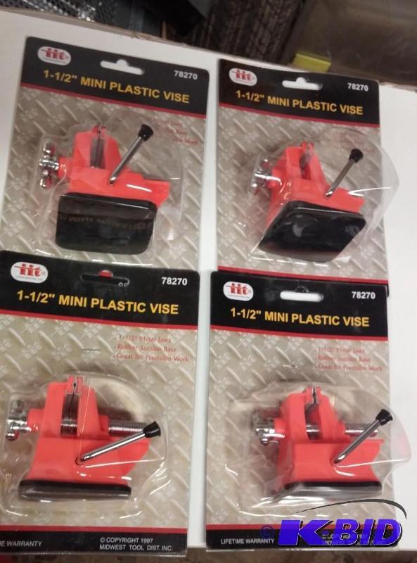 lot 19 image: Lot of 4 mini Vises. Suction cup bottom...