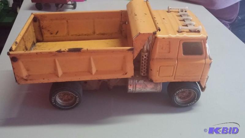 Vintage ERTL Dump Truck, broken window...