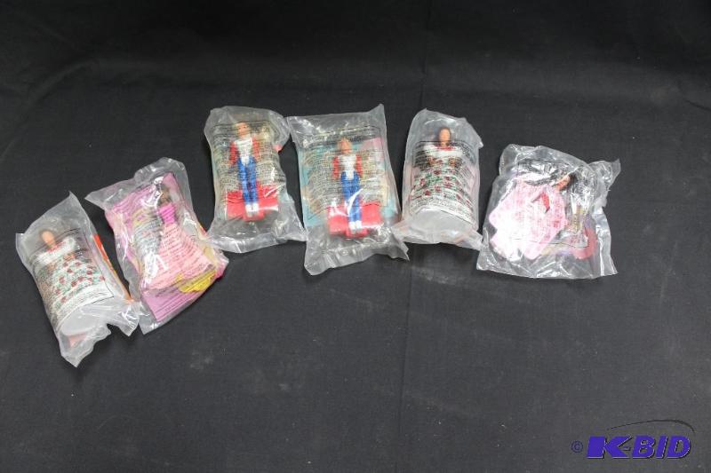 lot 23 image: Lot of 6 McDonalds Barbie Toys