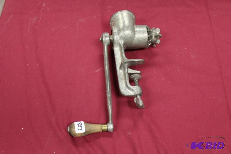 lot 323 image: Meat Grinder  Works Well...